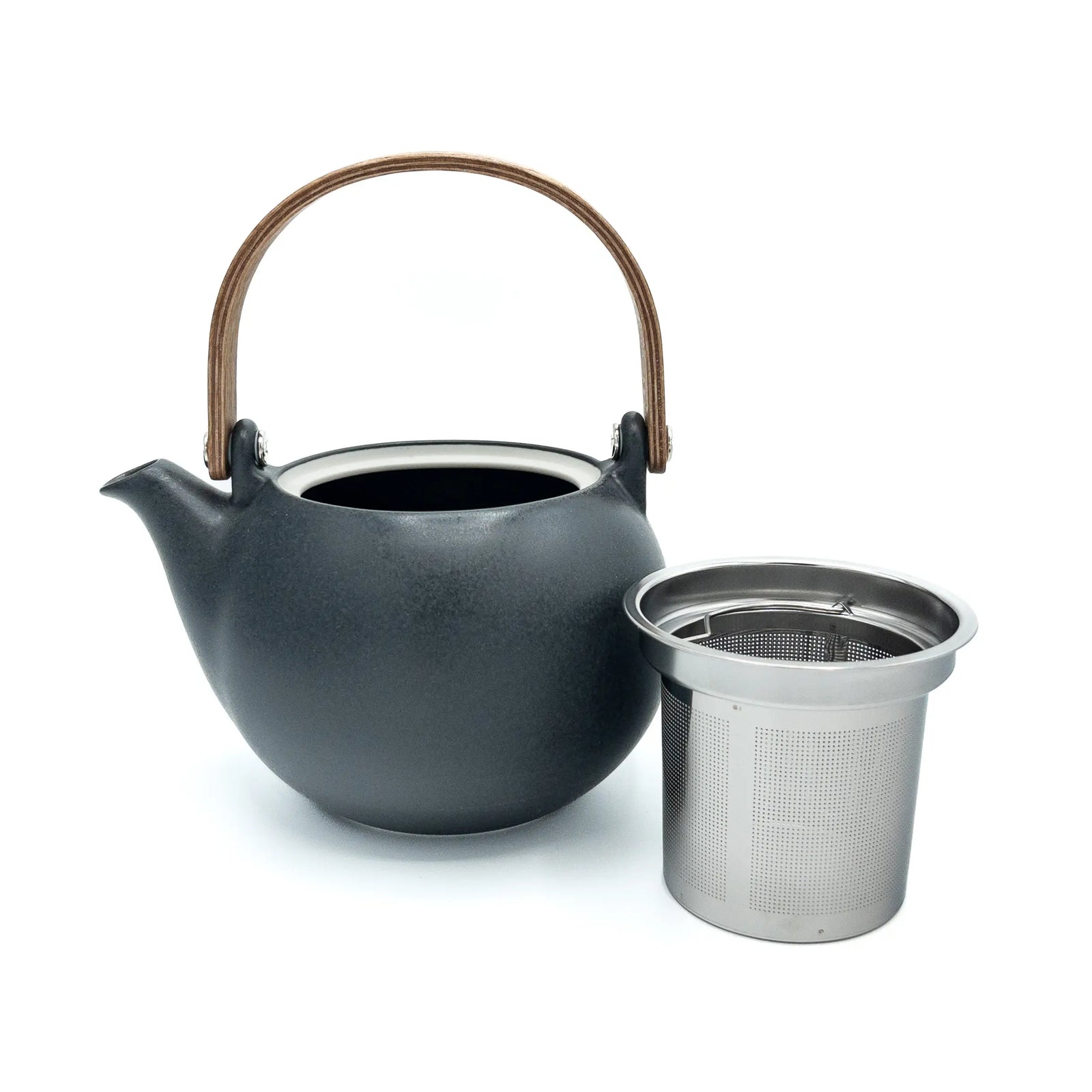Black teapot with a wooden handle and a metal tea infuser on a white background
