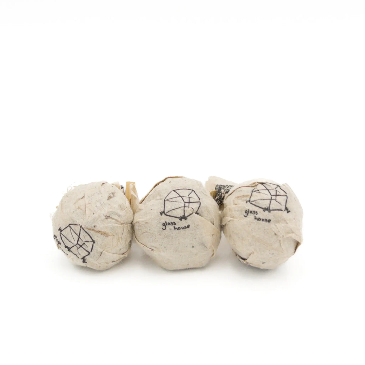 2025 White2Tea Glass House Ripe Puerh Minis - 7 gram tea balls on a white background
